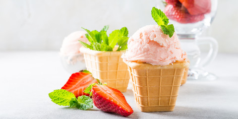Waffle cup with strawberry ice cream. Healthy food concept. Banner.