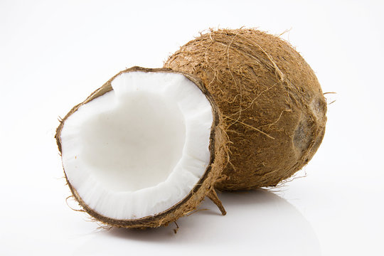 Ripe and appetizing coconut and its parts are isolated on white background