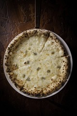 Gorgonzola pizza on table