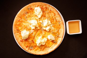 Gorgonzola pizza on table
