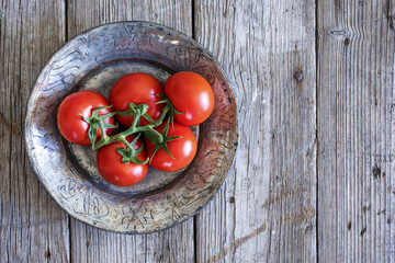 Vegetables in plate on wooden table