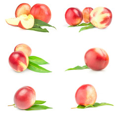 Group of juicy ripe peaches over a white background