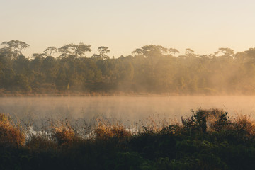 Sunrise or sunset over the lake.