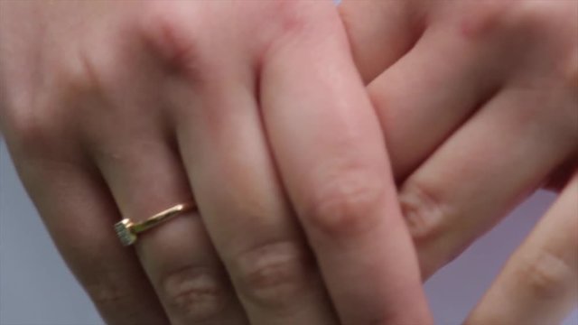 Jeweler bracelet on the bride's hand. Bride's hands with ring. Wedding. Wedding day. Luxury bracelet on the bride's hand close-up Hands of the bride before wedding. Wedding accessories. Bride's hands