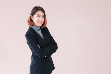 Modern business women confident pose with space pink background, Business woman standing, Asian people young beautiful businesswoman smile and wear shirt black suit. space pink background for texture