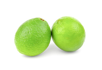 Two juicy lime isolated on white background cutout