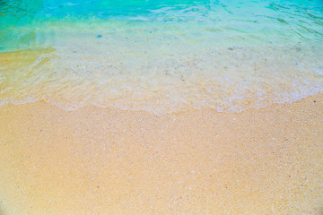 Fototapeta na wymiar Thailand summer travel sea wave, at sea beach Krabi Phi Phi Island Phuket park on white sand blue sky emerald green ocean water. space for texture