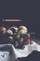 Basket with farmers eggs on dark background