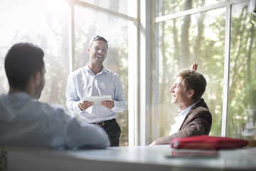Business people brainstorming in a team meeting in office