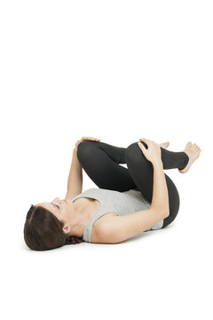 Yoga woman gray_anada balasana_feets down
