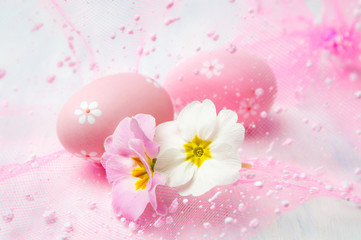 Pink Easter egg and two flowers
