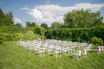 Flowers decorate wedding arch