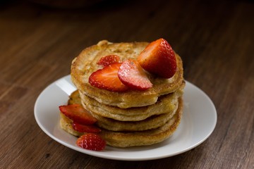 Stack of homemade wholegrain buckwheat pancakes. Individually fried on pan, thus imperfect shape