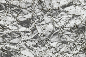 abstract silver wrinkled paper texture background