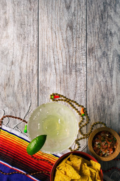 Fiesta: Margarita With Chips And Salsa On Wood Background