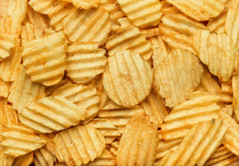 Fried fatty potato chips.