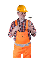 Handwerker mit Latzhose und Helm, verschiedene Gesichtsausdrücke