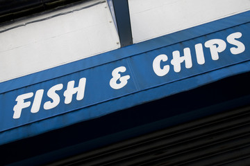 Blue Fish and Chips Sign on Shop Front