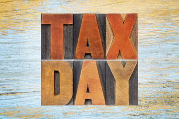 tax day word abstract in vintage wood type