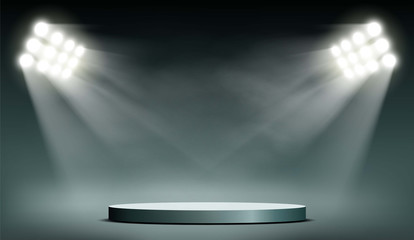 Round podium illuminated by searchlights. - obrazy, fototapety, plakaty
