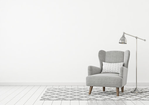 Neutral classic livingroom interior with grey fabric armchair, pillow, lamp and nordic style rug on empty white wall background. 3D rendering.