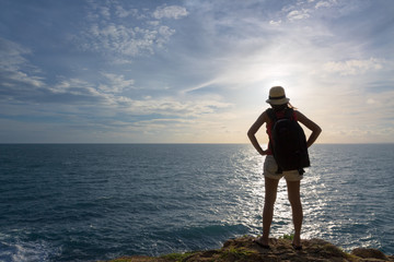 Traveler asia woman on sea cliff