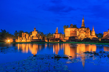 Buddha statue at Wat Mahathat in Sukhothai Historical Park where is the old town of Thailand in 800 year ago. 