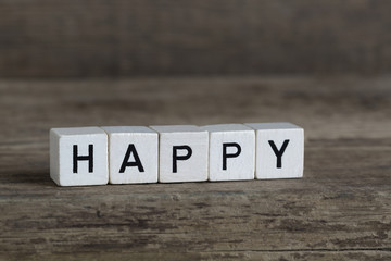 Happy, written in cubes