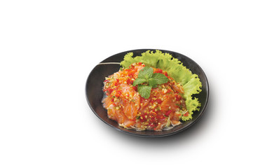 Isolated and clipping path of spicy salmon salad in bowl.