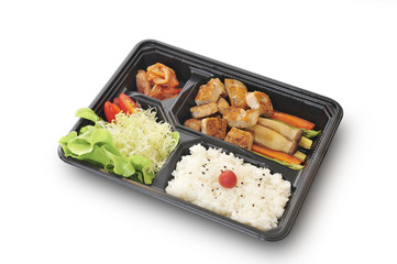 Isolated and clipping path of pork steak set in bento box set.