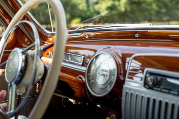 Retro car, retro torpedo car, vintage steering wheel - Powered by Adobe