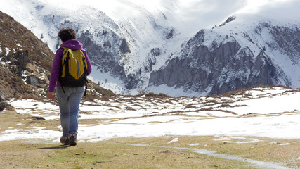 hiker in the Pyrenees in spring with snow, col du Soulor