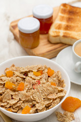 cereals with dry fruits in bowl and jam