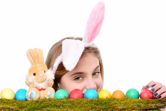 happy easter girl in bunny ears with colorful eggs, rabbit