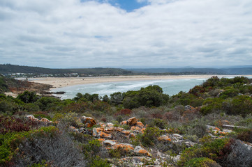 Fototapeta na wymiar Beach and Coastline with Houses at Plettenberg Bay in South Africa