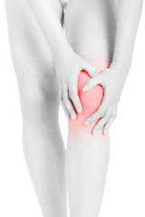 Woman fatigued legs with hands touching knee, red area isolated on white, clipping path