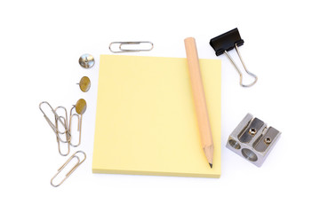 Fototapeta premium Office supplies isolated on white background, pencil, paper, staples, pushpins, pencil sharpeners