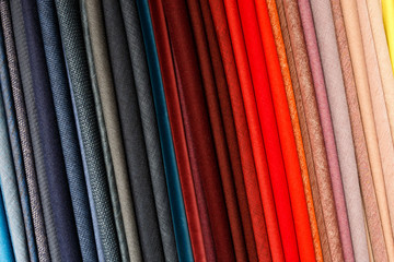 Different colored fabrics on display 
