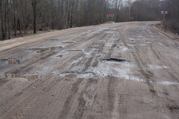 holes in asphalt road