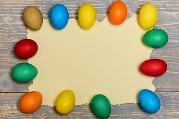 set with colorful eggs on burnt paper . Happy Easter concept