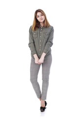 Young beautiful blonde woman in gray trousers