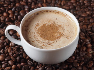 A cup of coffee with cinnamon