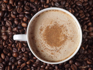 A cup of coffee with cinnamon