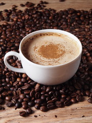 A cup of coffee with cinnamon
