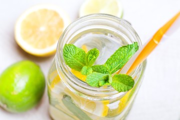 Summer drink with lime, mint and lemon
