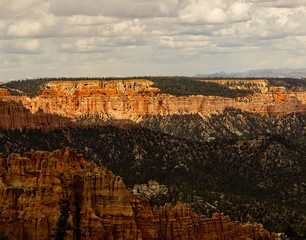 Bryce Canyon National Park, a sprawling reserve in southern Utah, is known for crimson-colored hoodoos, which are spire-shaped rock formations.