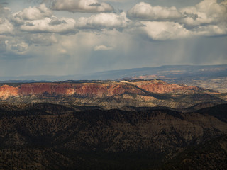 Bryce Canyon National Park, a sprawling reserve in southern Utah, is known for crimson-colored hoodoos, which are spire-shaped rock formations.