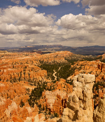 Bryce Canyon National Park, a sprawling reserve in southern Utah, is known for crimson-colored hoodoos, which are spire-shaped rock formations.