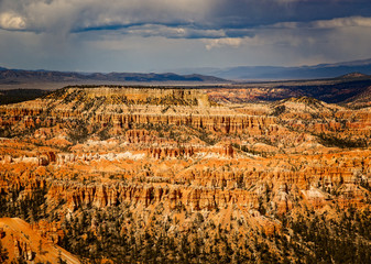 Bryce Canyon National Park, a sprawling reserve in southern Utah, is known for crimson-colored hoodoos, which are spire-shaped rock formations.