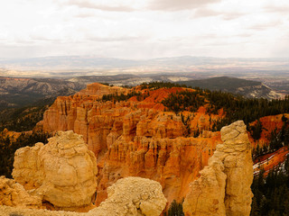 Bryce Canyon National Park, a sprawling reserve in southern Utah, is known for crimson-colored hoodoos, which are spire-shaped rock formations.